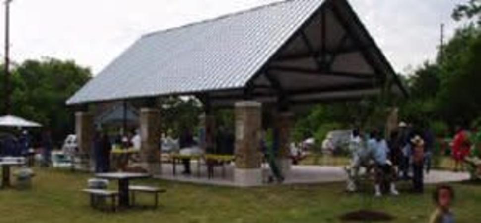 A covered pavilion is shown with a concrete pad.