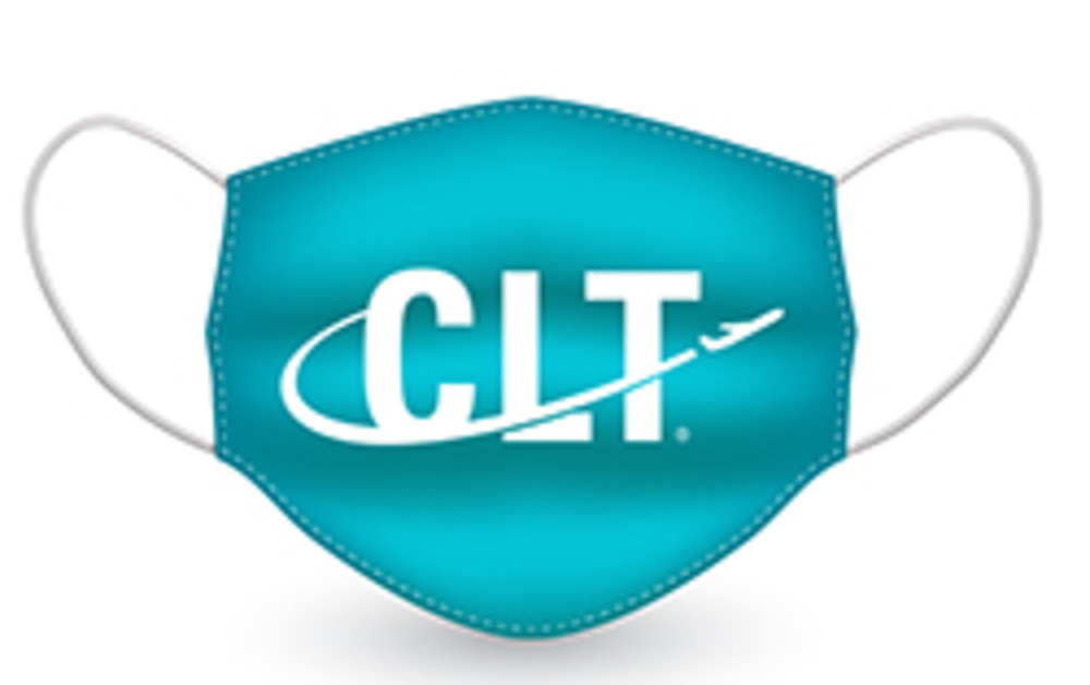 A teal mask with the CLT Airport logo on it.