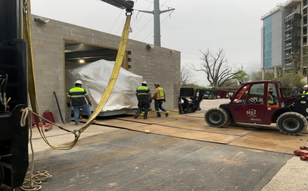 Central Utility Plant: Austin Energy heat exchanger delivery and installation in progress.