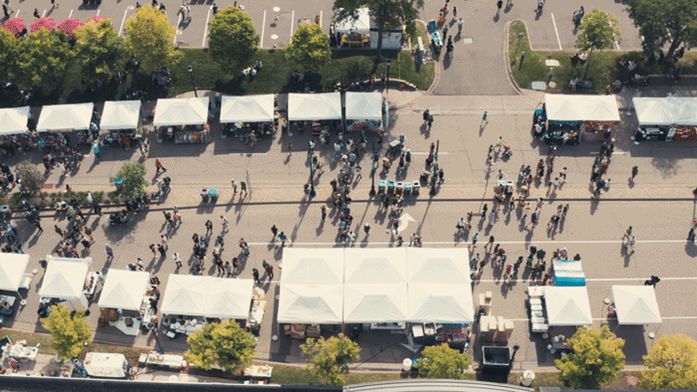 GIF of aerial view of street event.