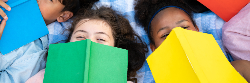 kids-with-books-covering-faces