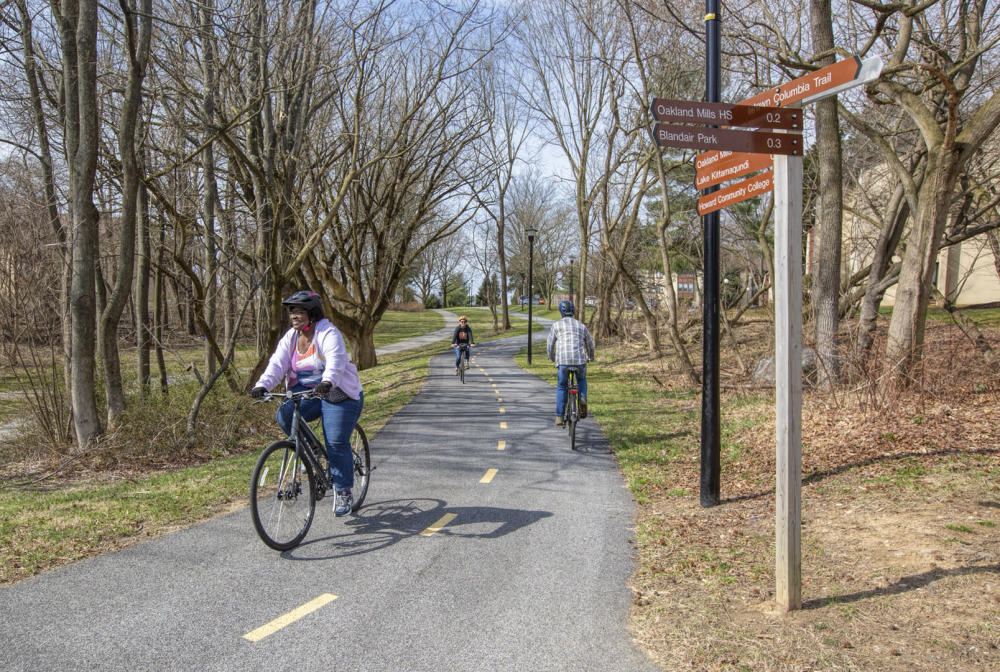People biking on a shared-use path (trail)
