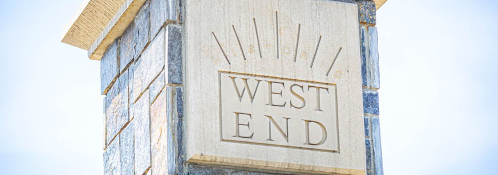 Stone pillar engraved with "West End"