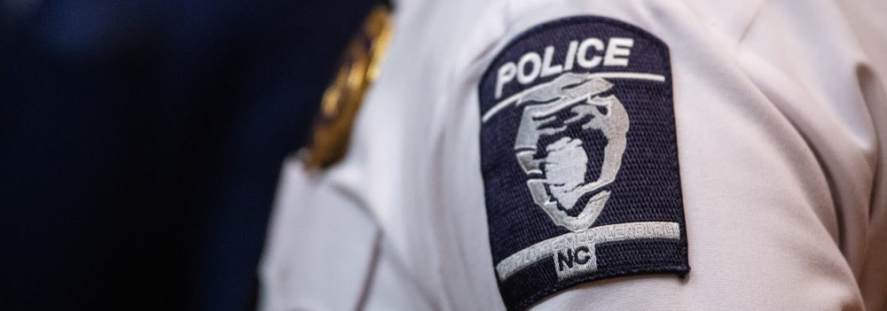 Image of Charlotte-Mecklenburg Police Department patch on officer's arm