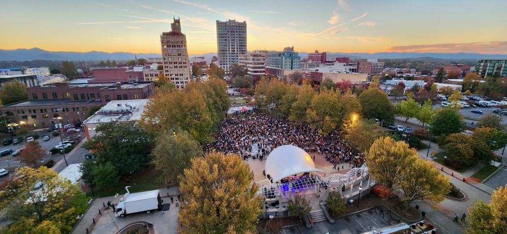 Image showing a crowd at a Candlight Vigil held to honor victims of Helene on October 24, 2024