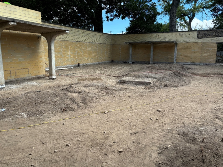 Before photo of Women's Shower & Dressing Court area prior to installation of new plumbing.