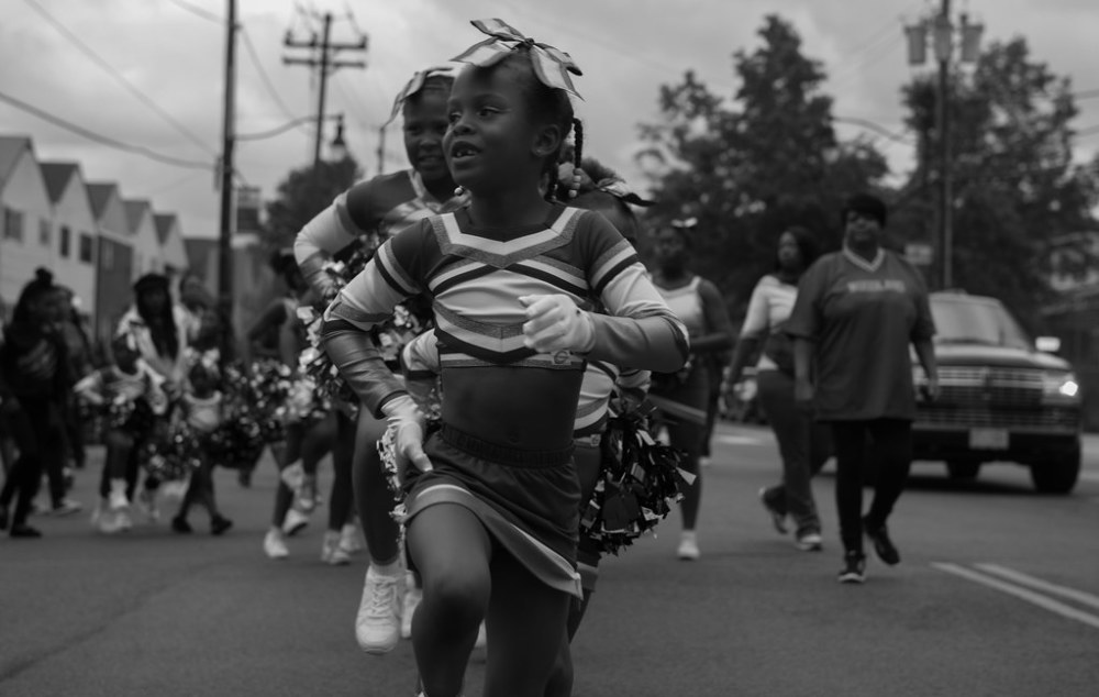 Little girl marching in a parade
