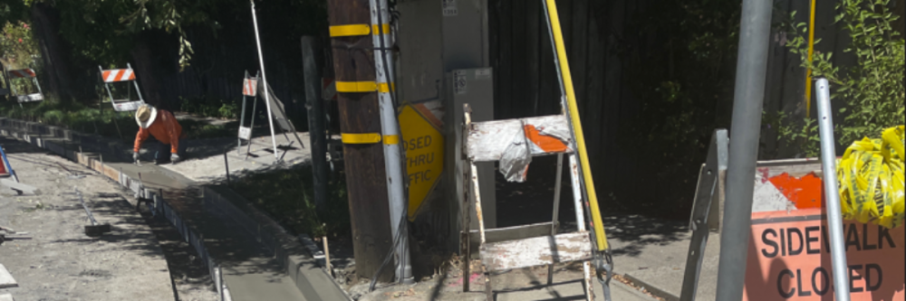 Concrete street resurfacing and signage