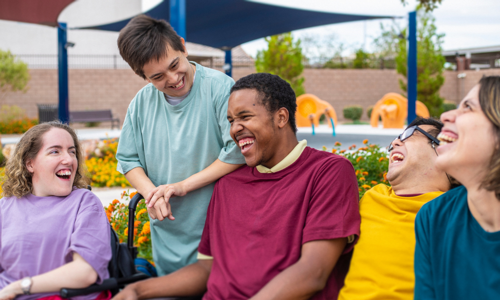 Individuals with disabilities laughing together