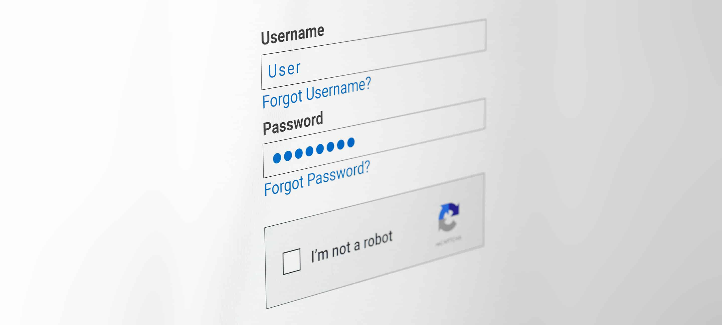 A screen prompts the user to answer a CAPTCHA test to log in to their account