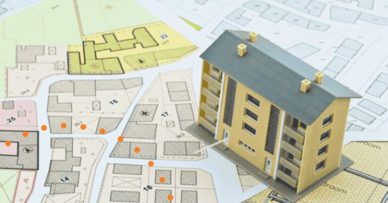 A model house on top of maps